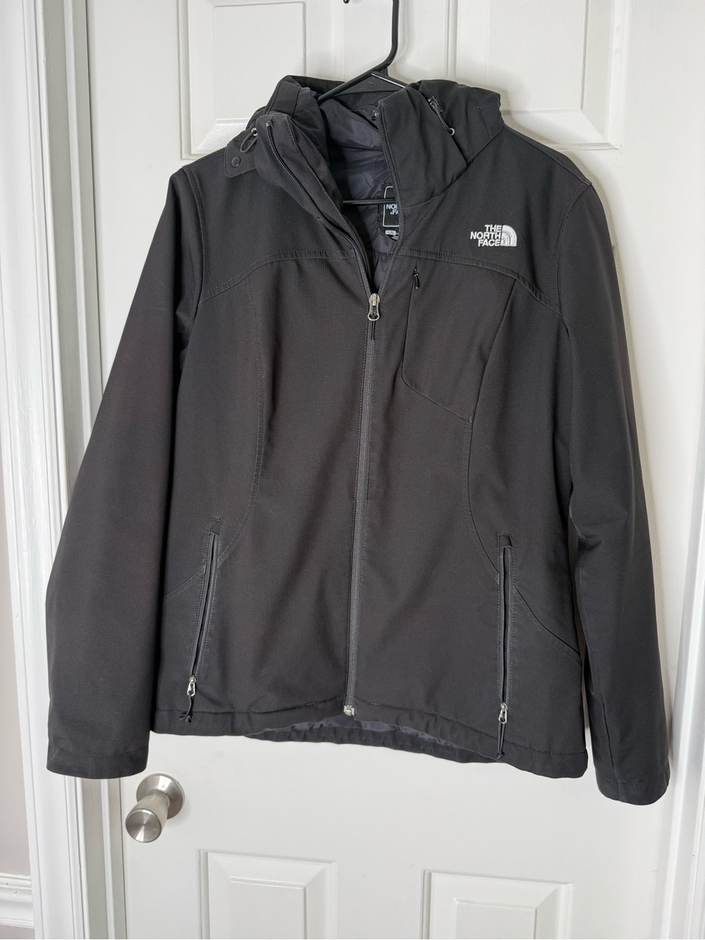 The North Face Black Hooded Jacket with Silver Zipper